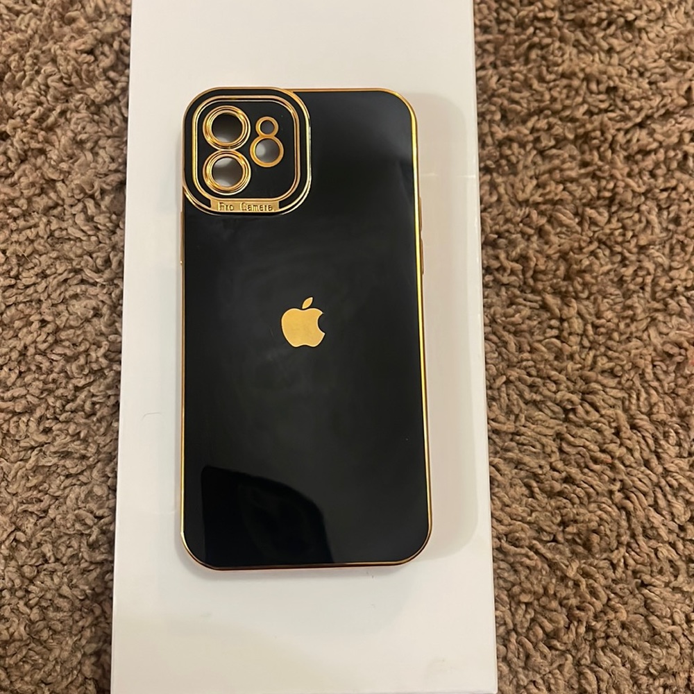 iPhone 13 mini, black and gold